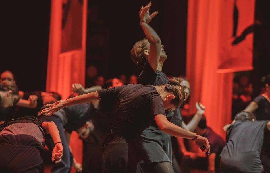 Dynamic dance performance captured with vivid lighting and expressive movement.